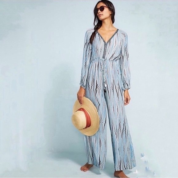 Anthropologie Pants - Anthropologie Irveni Wide Leg Relaxed Long Sleeve
Tassel Blue Jumpsuit Size L